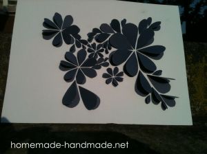 Made of a zillion cut and folded paper hearts.