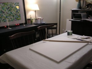 So we got out our canvas, a yardstick, several shades of green craft paint + white + silver metallic for some depth, a couple brushes and a paper plate for mixing.