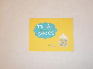 Martha Stewart candy stickers have a little dimensional but are flat enough to mail. The lettering is on a shape I cut with my Cuttlebug.