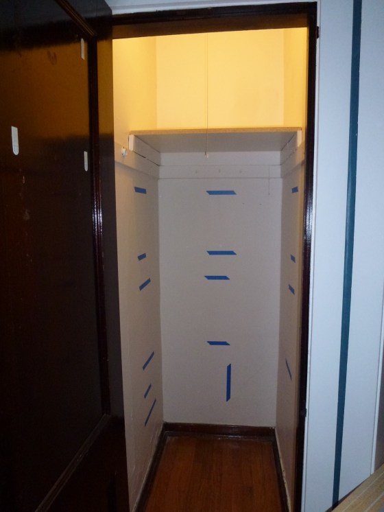 Hall Closet Taped Shelves